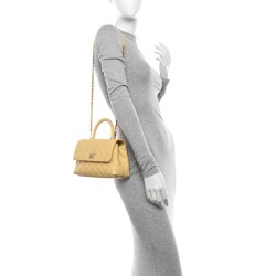 Chanel Caviar Quilted Mini Coco Handle Flap Yellow