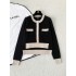 Chanel 26K Métiers d’Art Cashmere Black Knit Cardigan | Layered Look Bow Button Cardigan