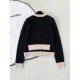 Chanel 26K Métiers d’Art Cashmere Black Knit Cardigan | Layered Look Bow Button Cardigan