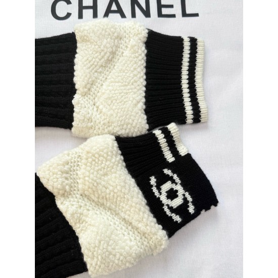 Chanel 25N Ski Collection Cashmere Blend Cardigan | Black Knit with Gold Buttons