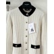 Chanel 25N Ski Collection Cashmere Blend Cardigan | White Knit with Gold Buttons