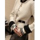 Chanel 25N Ski Collection Cashmere Blend Cardigan | White Knit with Gold Buttons